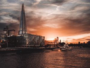 Preview wallpaper tower, buildings, river, embankment, city