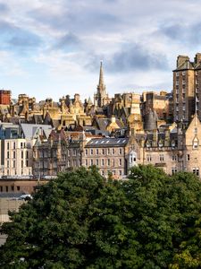 Preview wallpaper tower, buildings, roofs, architecture, trees, city