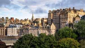 Preview wallpaper tower, buildings, roofs, architecture, trees, city