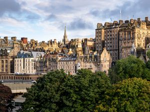 Preview wallpaper tower, buildings, roofs, architecture, trees, city