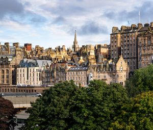 Preview wallpaper tower, buildings, roofs, architecture, trees, city