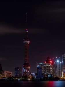 Preview wallpaper tower, buildings, sea, night, city