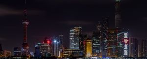 Preview wallpaper tower, buildings, sea, night, city