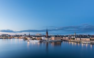 Preview wallpaper tower, buildings, ship, river, lights, city, twilight