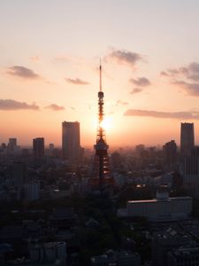 Preview wallpaper tower, buildings, sunrise, sky, city