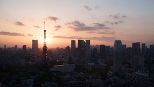 Preview wallpaper tower, buildings, sunrise, sky, city