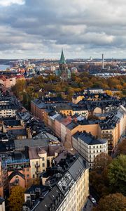 Preview wallpaper tower, city, architecture, buildings, roofs