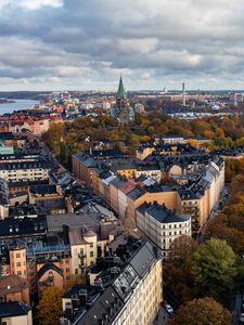 Preview wallpaper tower, city, architecture, buildings, roofs