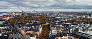 Preview wallpaper tower, city, architecture, buildings, roofs