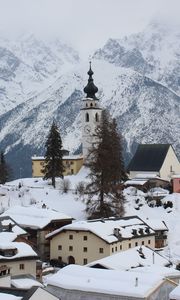 Preview wallpaper tower, clock, snow, buildings, mountain