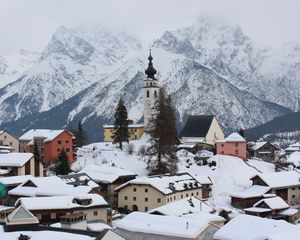 Preview wallpaper tower, clock, snow, buildings, mountain