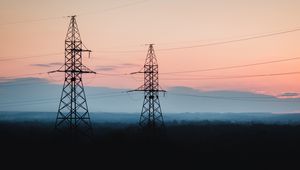 Preview wallpaper tower, construction, silhouette, forest, twilight, dark