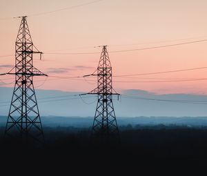 Preview wallpaper tower, construction, silhouette, forest, twilight, dark