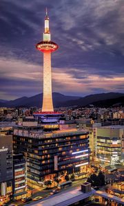 Preview wallpaper tower, glow, lights, buildings, twilight, city