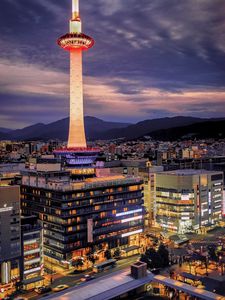 Preview wallpaper tower, glow, lights, buildings, twilight, city