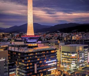 Preview wallpaper tower, glow, lights, buildings, twilight, city