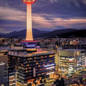 Preview wallpaper tower, glow, lights, buildings, twilight, city