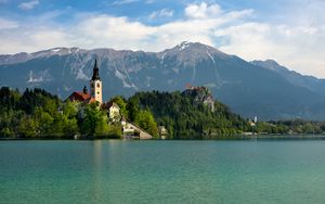 Preview wallpaper tower, house, mountains, trees, lake