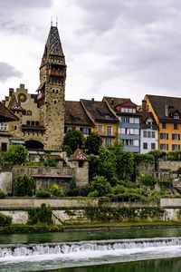 Preview wallpaper tower, houses, buildings, river, architecture