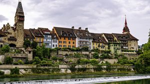 Preview wallpaper tower, houses, buildings, river, architecture