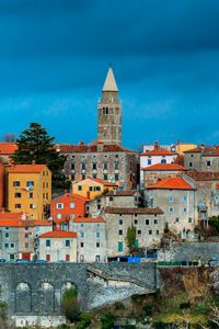 Preview wallpaper tower, houses, buildings, architecture, city
