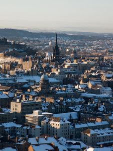 Preview wallpaper tower, houses, buildings, snow, city, winter