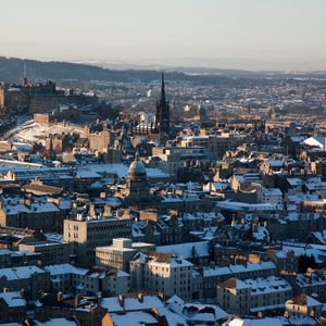 Preview wallpaper tower, houses, buildings, snow, city, winter