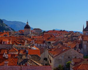 Preview wallpaper tower, houses, roofs, tiles, city