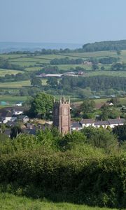 Preview wallpaper tower, houses, trees, village