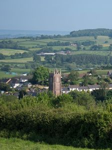 Preview wallpaper tower, houses, trees, village
