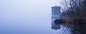 Preview wallpaper tower, lake, reflection, tree, branches, fog