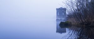 Preview wallpaper tower, lake, reflection, tree, branches, fog