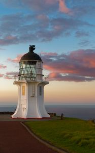 Preview wallpaper tower, lighthouse, clouds, ocean, twilight