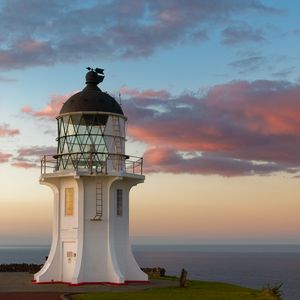 Preview wallpaper tower, lighthouse, clouds, ocean, twilight