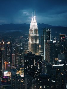 Preview wallpaper tower, lighting, buildings, city, night