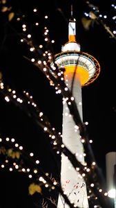 Preview wallpaper tower, lights, bokeh, branches, dark