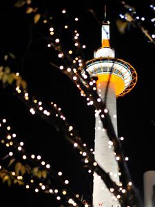 Preview wallpaper tower, lights, bokeh, branches, dark