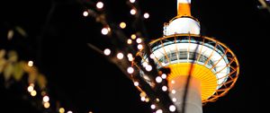 Preview wallpaper tower, lights, bokeh, branches, dark
