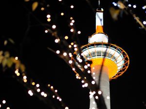 Preview wallpaper tower, lights, bokeh, branches, dark