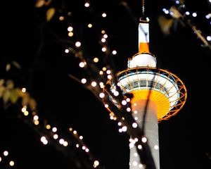 Preview wallpaper tower, lights, bokeh, branches, dark