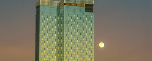 Preview wallpaper tower, moon, building, architecture