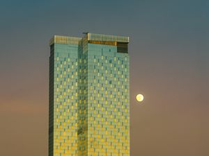 Preview wallpaper tower, moon, building, architecture