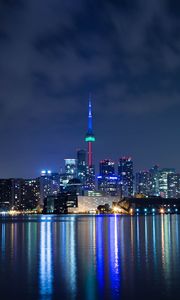 Preview wallpaper tower, night city, architecture, lights, reflection