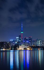 Preview wallpaper tower, night city, architecture, lights, reflection