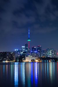 Preview wallpaper tower, night city, architecture, lights, reflection