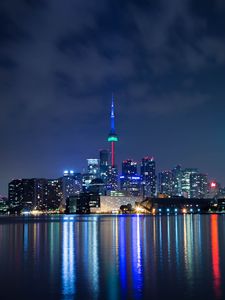 Preview wallpaper tower, night city, architecture, lights, reflection