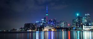 Preview wallpaper tower, night city, architecture, lights, reflection