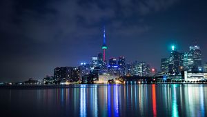 Preview wallpaper tower, night city, architecture, lights, reflection