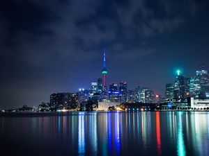 Preview wallpaper tower, night city, architecture, lights, reflection
