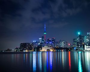 Preview wallpaper tower, night city, architecture, lights, reflection
